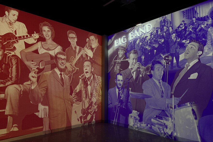 Images of big band musicians are projected onto the walls in the Music Experience Center as part of the "Not Fade Away" experience. 