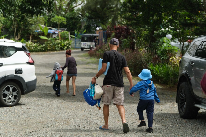 Families pick up children after school in Tagaytay, Cavite, Philippines.