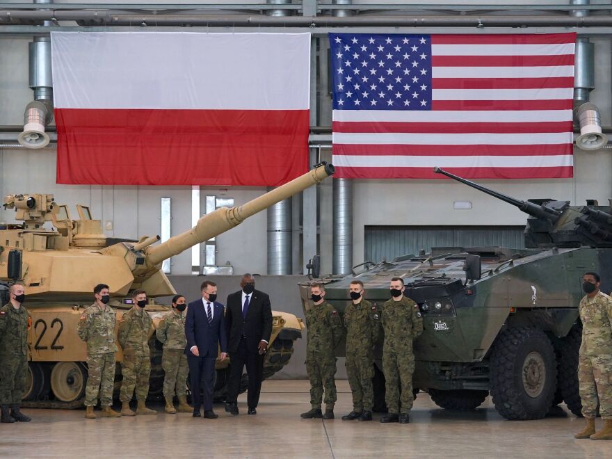 Secretary of Defense Lloyd Austin and Polish Defense Minister Mariusz Blaszczak pose with Polish and U.S. soldiers at the 33rd Air Base of the Polish Air Force near Powidz.