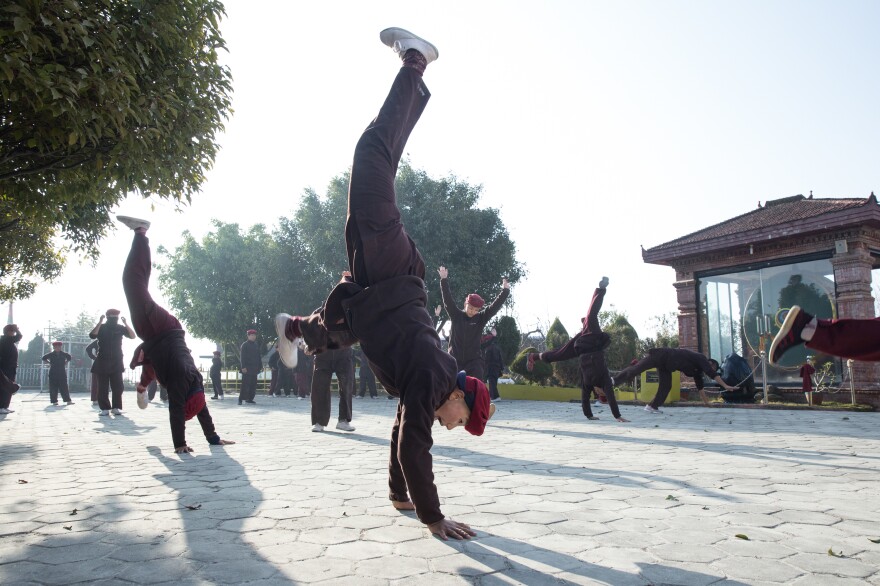 Nuns practice kung fu as a part of their daily routine at the Druk Amitabha Mountain nunnery in Kathmandu, Nepal.