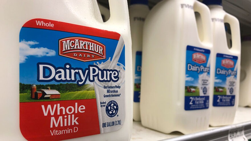 Jugs of McArthur Dairy milk, a Dean Foods brand, are shown at a grocery store, Tuesday, Nov. 12, 2019, in Surfside, Fla. Dean Foods, America's biggest milk processor, filed for bankruptcy Tuesday amid a steep, decades-long drop-off in U.S. milk consumption blamed on soda, juices and, more recently, nondairy substitutes.