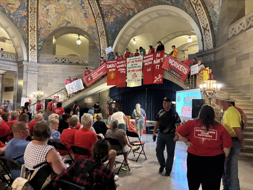 People gather inside the Missouri Capitol rotunda on Wednesday to protest against data center development in the state.