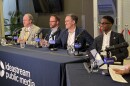 (from left to right) Northeast Ohio Pilots Association President Ned Parks, Council Member Charles Slife, North Coast Waterfront Development Corporation Executive Director Scott Skinner and Mayor Justin Bibb speak at a public forum about the future of Burke Lakefront Airport.