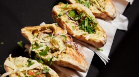 Sandwiches at Sandwich City presented by Cayman Jack hosted by Jeff Mauro as part of the Food Network New York City Wine & Food Festival presented by Capital One at Harbor NYC Rooftop in New York City.