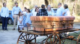 Prairie Creek Conservation Cemetery operations coordinator Kevin Moran addresses attendees of the morning service. “This is a fairly participatory process, or at least it can be,” Moran said. (Alexis Vivanco/WUFT News)