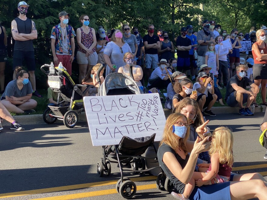 Hundreds gathered Sunday evening for a community prayer event in the Butler-Tarkington neighborhood.
