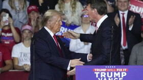 Republican presidential nominee former President Donald Trump and Virginia Gov. Glenn Youngkin, right, at a campaign rally at the Salem Civic Center, Saturday, Nov. 2, 2024, in Salem, Va. (AP Photo/Steve Helber)
