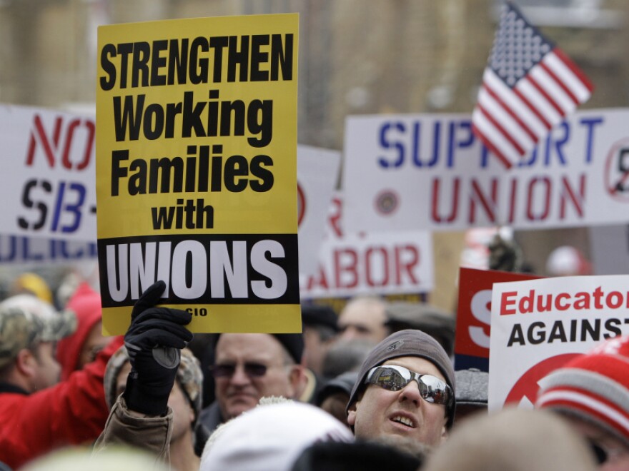 Demonstrators gathered outside the Ohio Statehouse last week to protest Senate Bill 5, which would have banned collective bargaining for state workers. Unions say legislation being pushed by Republican governors nationwide is an attack on their very existence.