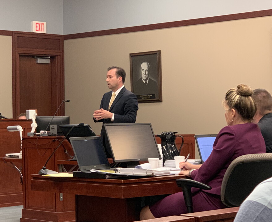 William Strampel’s attorney John Dakmak (center) delivers his opening statement while Assistant Attorney General Danielle Hagaman-Clark takes notes. Photo credit: Cheyna Roth