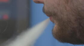 Exhaling smoke from an e-cigarette. (WFIU/WTIU)