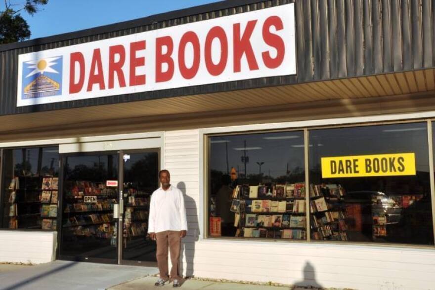 Desmond Reid stands in front of his Longwood bookstore, DARE Books, in 2014. The shop, specializing in multicultural literature, has experienced a large spike in sales since the death of George Floyd.