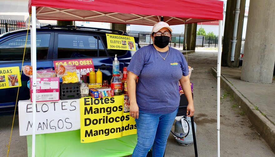 Marita, 37, stands in front of her fruit and snack stand under the Pontchartrain Expressway in New Orleans on May 28, 2021.