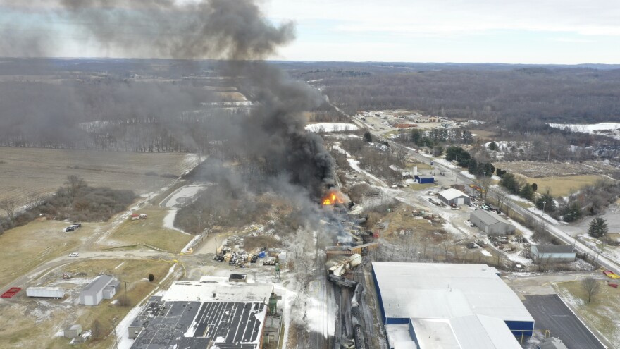 This photo taken with a drone shows portions of a Norfolk and Southern freight train that derailed Friday night in East Palestine, Ohio are still on fire at mid-day Saturday, Feb. 4, 2023.