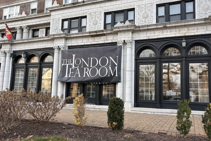 A London Tea Room banner hangs on a building off Union Boulevard in DeBaliviere Place.