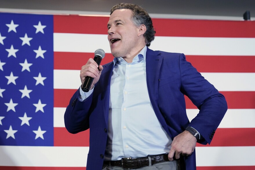 Republican candidate for Pennsylvania U.S. Senate Dave McCormick talks to supporters as returns show a close race during his returns watch party in the Pennsylvania primary election, Tuesday, May 17, 2022, in Pittsburgh. 