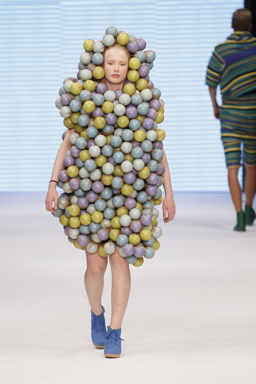 A model walks down the runway during the Maria Sofia Bahlner S/S 2013 Fashion Show from the Swedish School of Textiles during the Mercedes-Benz Stockholm Fashion Week.