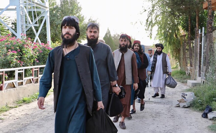 Taliban prisoners are released from Pul-e-Charkhi jail in Kabul, Afghanistan, on Aug. 13. The government is releasing Taliban prisoners to pave the way for negotiations between the warring sides in Afghanistan's protracted conflict.