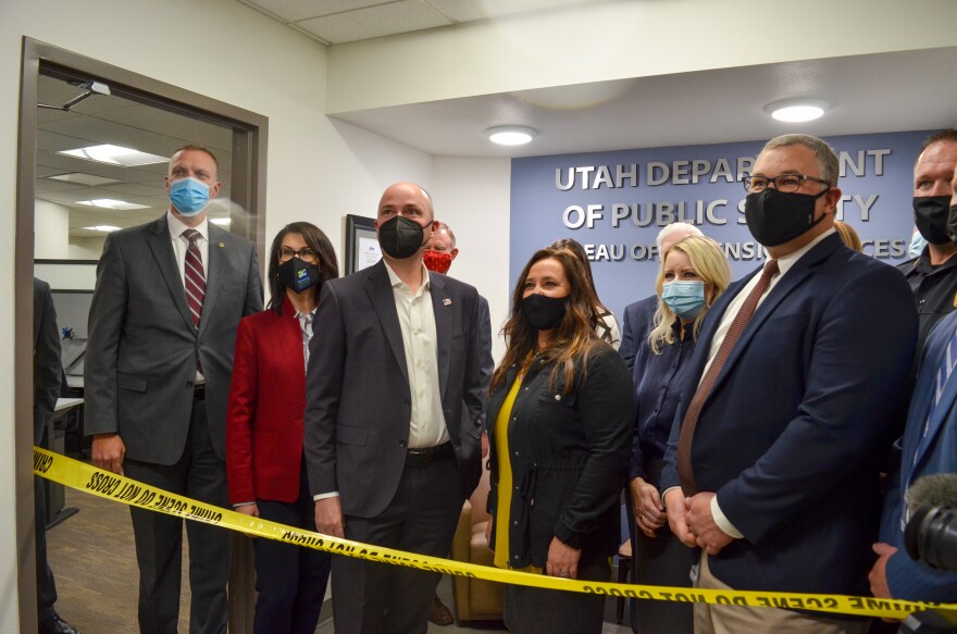 A photo of state and local officials at the ribbon cutting ceremony for the new crime lab based in the Utah Department of Public Safety building in Iron County. 
