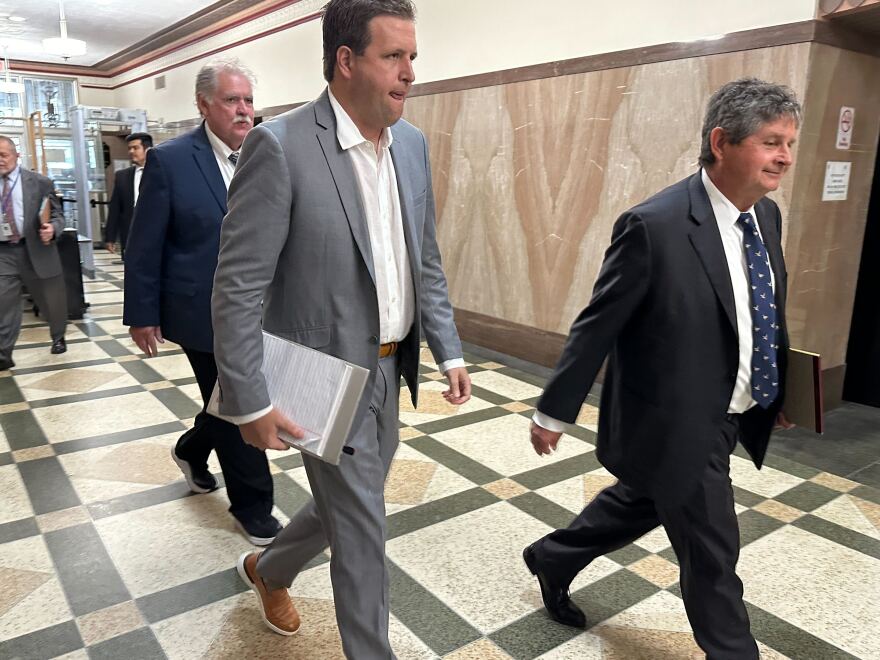 Former Epic encumbrance clerk and Epic Youth Services' CFO Josh Brock walks through the Oklahoma County District Court March 29, 2024, for the fifth day of a preliminary hearing in a case against Epic co-founders Ben Harris and David Chaney.