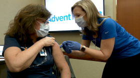 Sue Upper, nurse manager of the AdventHealth Orlando COVID unit, gets vaccinated December 16.