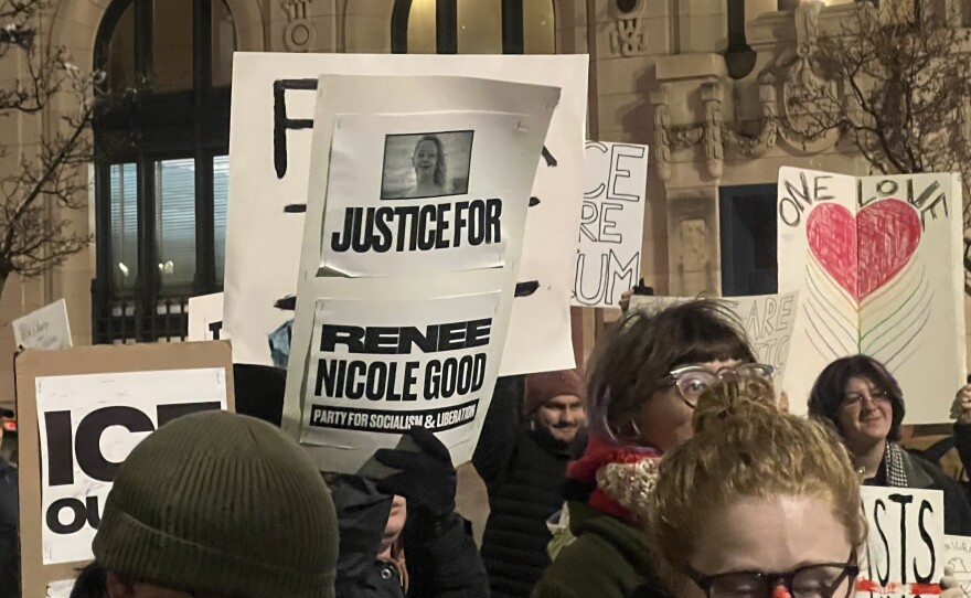 Protesters hold up signs and shout chants criticizing federal immigration enforcement activities in areas like Minneapolis, where earlier this month, ICE agents fatally shot Renee Good.