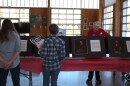Eugene community members engage with art installations highlighting the stories of immigrants in Oregon on March 16, 2026.