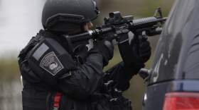 Swatting is a false 911 call that elicits an armed police response. (Matt Rourke/AP)