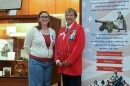 Brianna O'Shea, who leads the local Daughters of the American Revolution "E Pluribus Unum Educational Initiative," left, and Phyllis Breen, regent of the Irondequoit Chapter of the Daughters of the American Revolution, stand beside an exhibit exploring Rochester's connections to the American Revolution and its legacy. The exhibit features original artifacts from the New York State Museum and local collections and is presented by the Office of Rochester & Monroe County History, the Irondequoit Chapter of the Daughters of the American Revolution, and the Sons of the American Revolution.