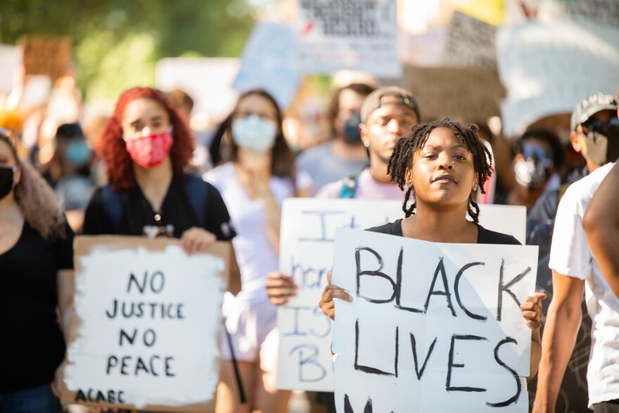 Demonstrators protest police brutality in Richmond, Va., in June.