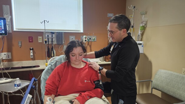 Mizzou's ER physiotherapist Marc Olive is examining a patient who has been in a car accident
