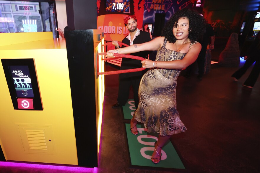 Jeffrey Figuereo and Perla Figuereo attend the Netflix House Dallas Opening Party on December 09, 2025.