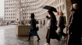 Shutdown flashback: Department of Health and Human Services employees leave their building in Washington after being told to go home as part of a federal shutdown in 1995.