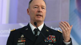U.S. Army Gen. Keith Alexander, director of the National Security Agency and commander of U.S. Cyber Command, speaks during a conference at the Ronald Reagan Building, in October.