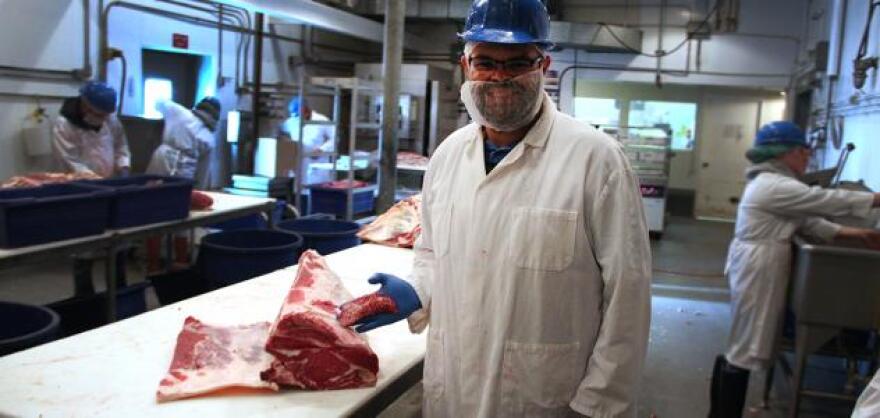 Amilton de Mello, assistant professor of meat science and food safety, shows off the Bonanza Cut, a new specialty cut that has been used for ground meat and is now being considered one of the best, though comparatively quite small, high-end delicacy on par with filet mignon.