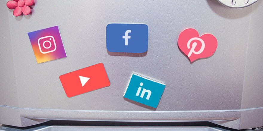 Social media logos on a fridge. 