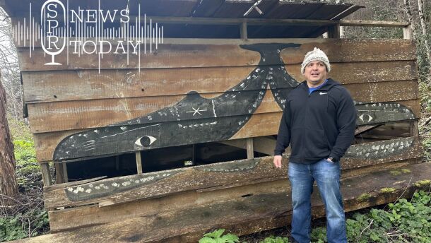 Daniel Greene, vice president of the Makah Whaling Commission, stands in front of a re-constructed longhouse on his family property in Waatch, the oldest of five original Makah villages, carbon dated at nearly 4,000 years old
