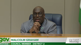 Charlotte City Council member Malcolm Graham switched his vote from opposing the I-77 toll lanes to supporting them.