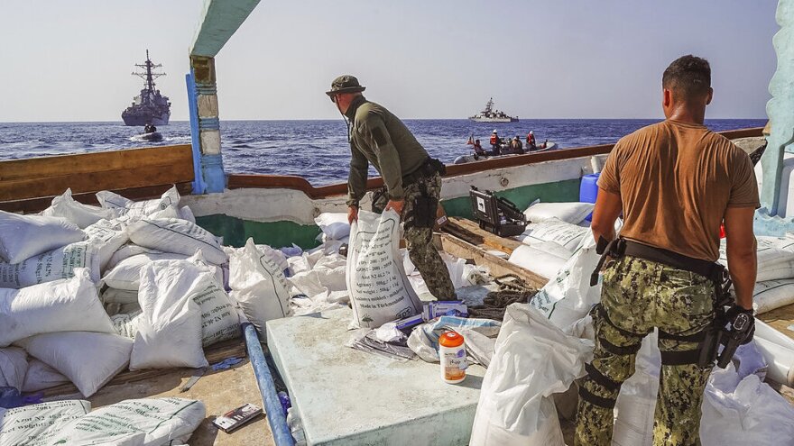 Sailors inventory urea and ammonium perchlorate found on a dhow intercepted in the Gulf of Oman. The U.S. Navy says it found 70 tons of a missile fuel component hidden among bags of fertilizer aboard a ship bound to Yemen from Iran.