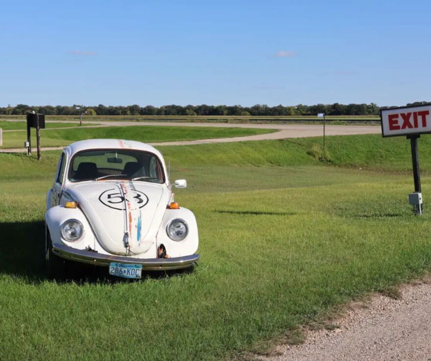 A Volkswagen Beetle costumed to look like Herbie sits to the side of a state road in Sky-Vu. Herbie, somehow, was not blown away by the wind. "Flat tires," explained Chris Novak | MPR News