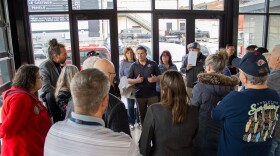 Erik King, Wexford County emergency manager, speaks to a crowd of disaster relief officials and volunteers ahead of the town hall meeting centered on flood recovery in Cadillac, Michigan, on Wednesday, April 29, 2026.