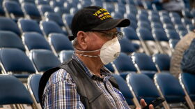 A person wears a mask at the Houston Rodeo. on March 9, 2020.