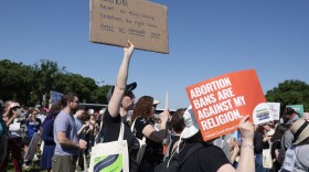 A protester carries a sign as they attend the "Jewish Rally for Abortion Justice" rally at Union Square near the U.S. Capitol on May 17, 2022 in Washington, DC. (Anna Moneymaker/Getty Images)
