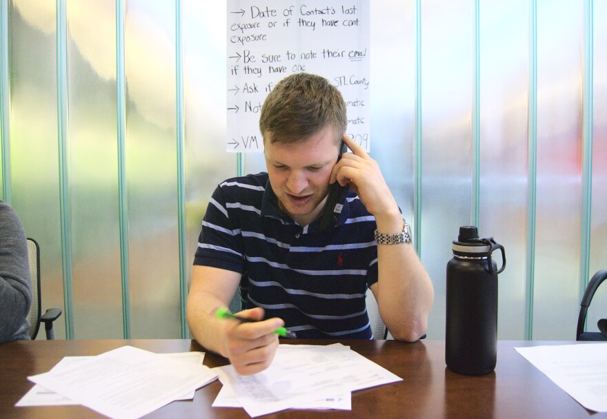 Anthony Brooks, third-year medical student at Washington University, calls a patient to tell them they have tested negative for COVID-19. Though most are not able to care directly for coronavirus patients, many med students are helping in other ways.