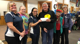Veterans of Foreign Wars Auxiliary members donate a check to Bethel Search and Rescue during the 2019 #BethelGives campaign at the Bethel Cultural Center.