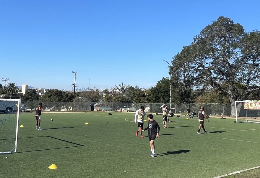 The field at San Antonio Park provides a view of the San Francisco skyline.