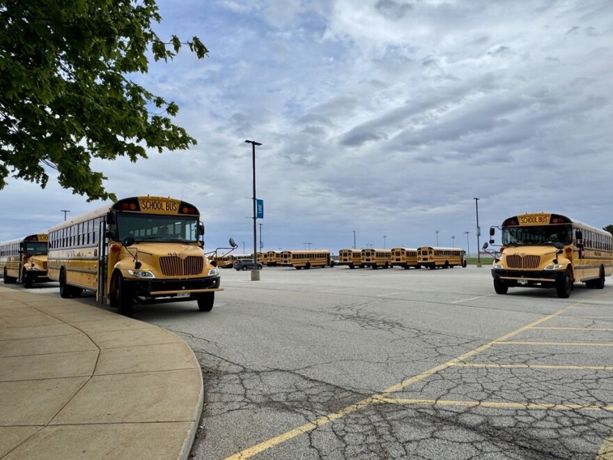 School buses parked in a large parking lot