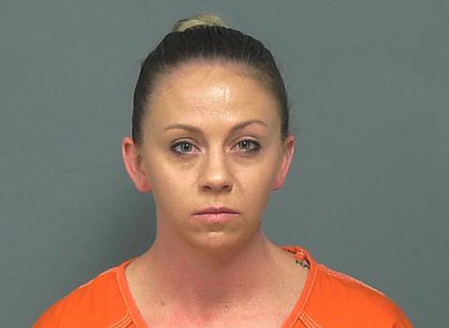 File photo provided by the Mesquite Police Department of former Dallas police officer Amber Guyger, taken Friday, Nov. 30, 2018. 