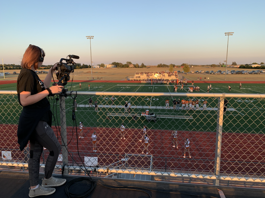 Evellyn Prothro on top of press box.