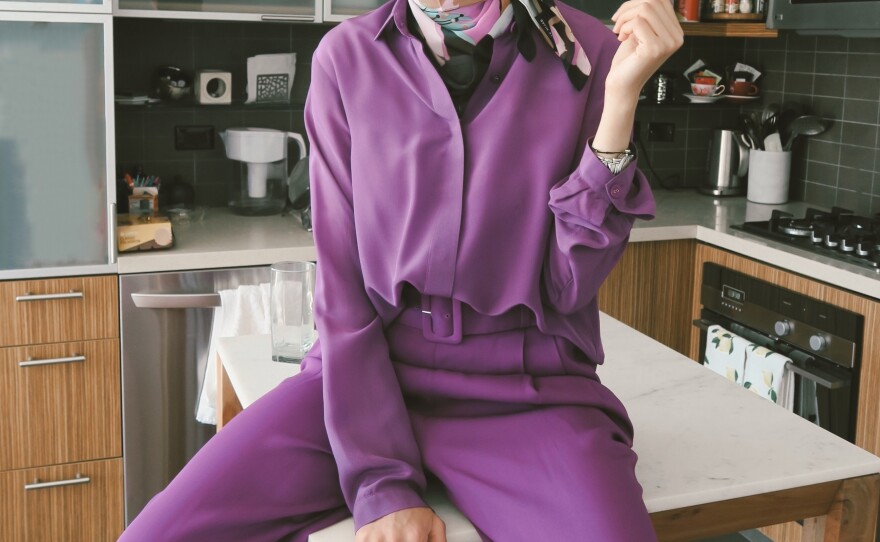 Melanie Elturk wears a monochrome outfit from eco-conscious brand Bouguessa.