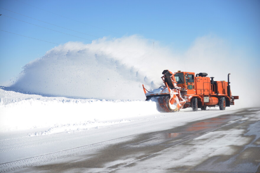 Oshkosh Snow Blower Truck clearing snow following a winter storm event that closed Interstate 94